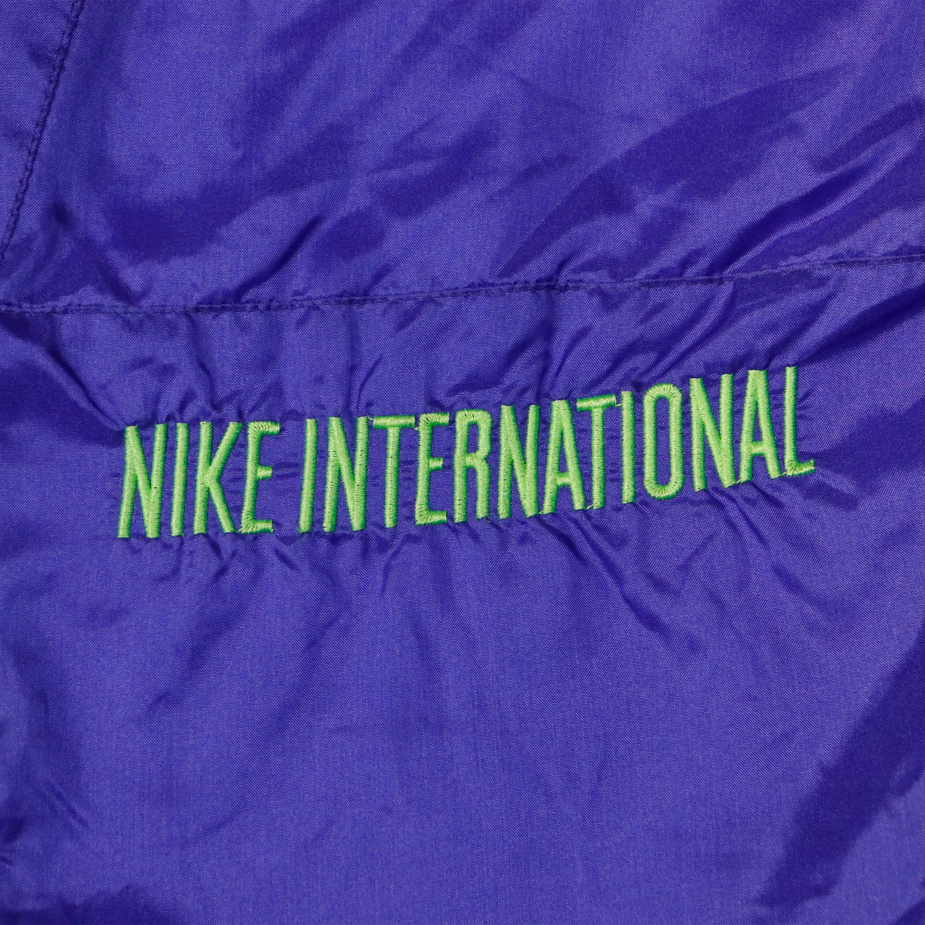 Vintage 90s Nike International Purple Green Windbreaker Jacket Size S FAIF.CA 